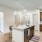 open kitchen with island seating in senior luxury apartments