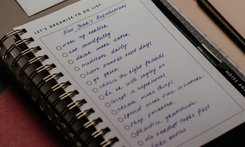 Notebook of new years resolutions for seniors